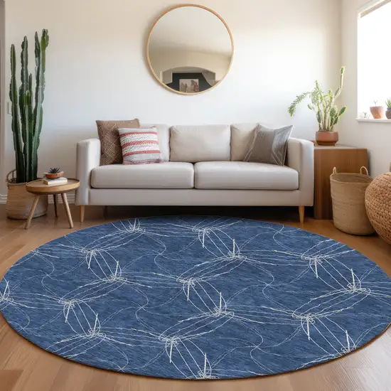 8' Navy Blue And Ivory Geometric Washable Round Rug With UV Protection Photo 4