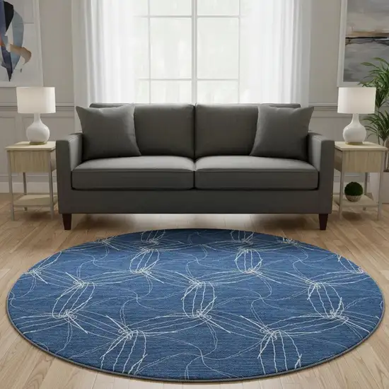 8' Navy Blue And Ivory Geometric Washable Round Rug With UV Protection Photo 2