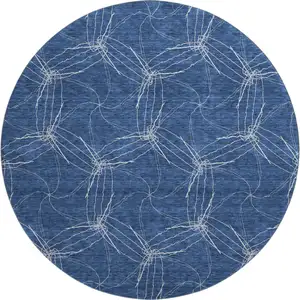 Photo of 8' Navy Blue And Ivory Geometric Washable Round Rug With UV Protection