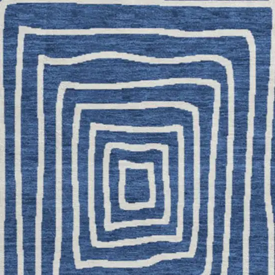 8' Navy Blue And Ivory Geometric Washable Round Rug With UV Protection Photo 3