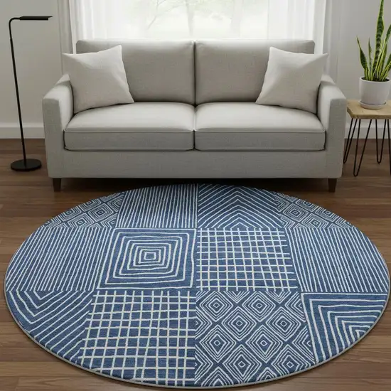 8' Navy Blue And Ivory Geometric Washable Round Rug With UV Protection Photo 2