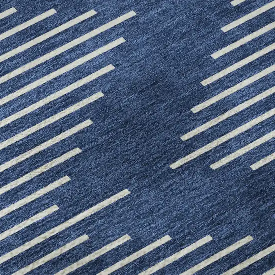 8' Navy Blue And Ivory Geometric Washable Round Rug With UV Protection Photo 8