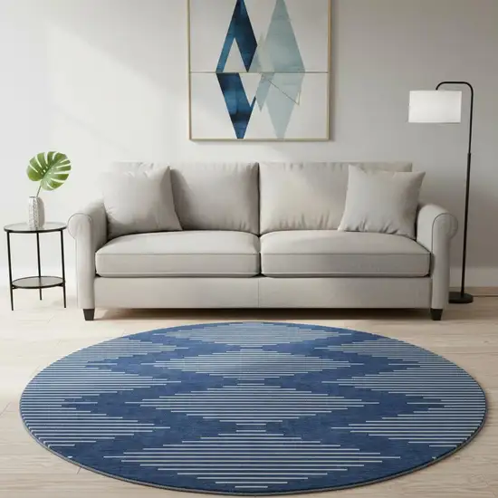8' Navy Blue And Ivory Geometric Washable Round Rug With UV Protection Photo 2