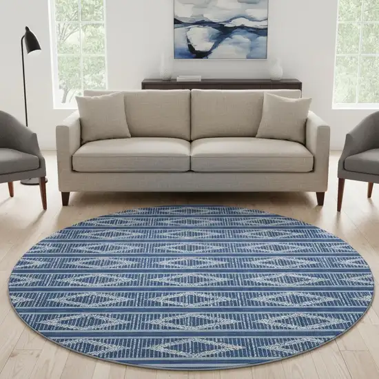 8' Navy Blue And Ivory Geometric Washable Round Rug With UV Protection Photo 2