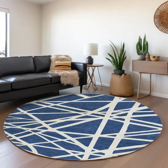 8' Navy Blue And Ivory Geometric Washable Round Rug With UV Protection Photo 4