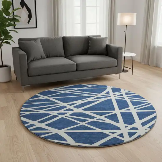 8' Navy Blue And Ivory Geometric Washable Round Rug With UV Protection Photo 2