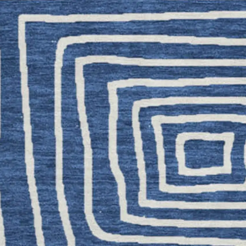 8' Navy Blue And Ivory Geometric Washable Round Rug With UV Protection Photo 2