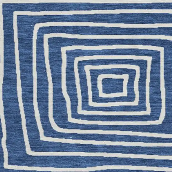 8' Navy Blue And Ivory Geometric Washable Round Rug With UV Protection Photo 3