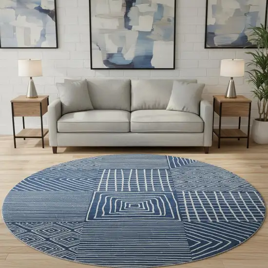 8' Navy Blue And Ivory Geometric Washable Round Rug With UV Protection Photo 2