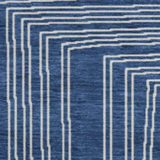 8' Navy Blue And Ivory Geometric Washable Round Rug With UV Protection Photo 2