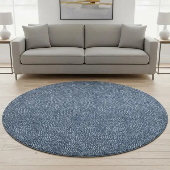 8' Navy Blue And Ivory Geometric Washable Round Rug With UV Protection Photo 2