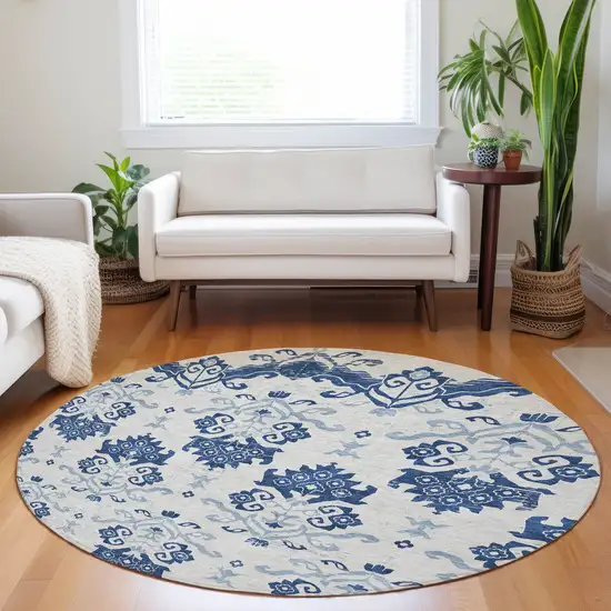 8' Navy Blue And Ivory Medallion Washable Round Rug With UV Protection Photo 5