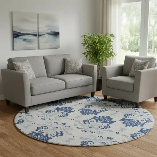 8' Navy Blue And Ivory Medallion Washable Round Rug With UV Protection Photo 1