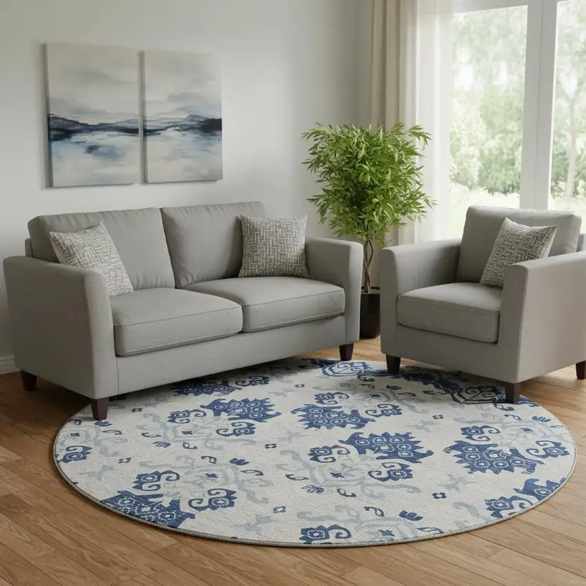 8' Navy Blue And Ivory Medallion Washable Round Rug With UV Protection Photo 1