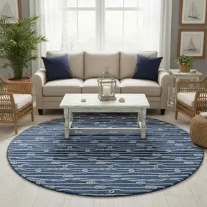 Photo of 8' Navy Blue And Ivory Nautical Washable Round Rug With UV Protection