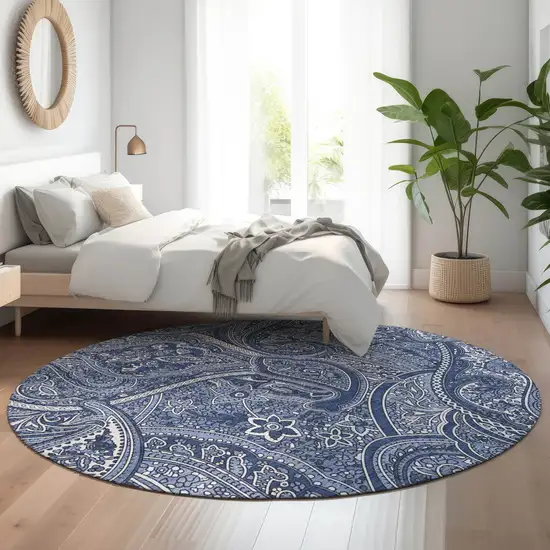 8' Navy Blue And Ivory Paisley Washable Round Rug With UV Protection Photo 5
