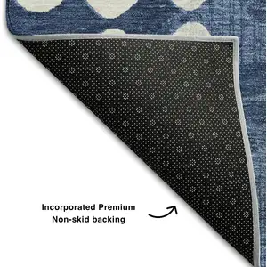 Photo of 8' Navy Blue And Ivory Polka Dot Washable Round Rug With UV Protection