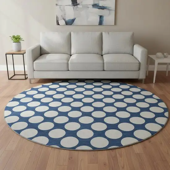 8' Navy Blue And Ivory Polka Dot Washable Round Rug With UV Protection Photo 2