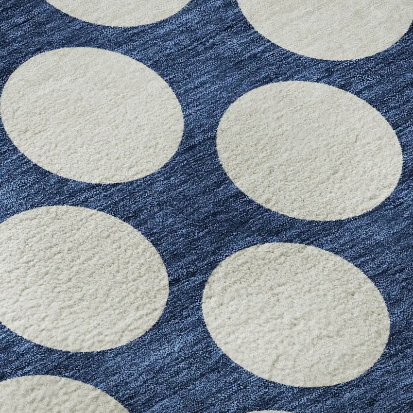 8' Navy Blue And Ivory Polka Dot Washable Round Rug With UV Protection Photo 9