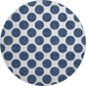 Photo of 8' Navy Blue And Ivory Polka Dot Washable Round Rug With UV Protection