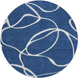 Photo of 8' Navy Blue And Ivory Round Abstract Washable Indoor Outdoor Area Rug
