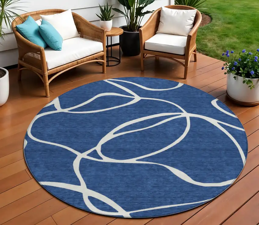 8' Navy Blue And Ivory Round Abstract Washable Indoor Outdoor Area Rug Photo 1