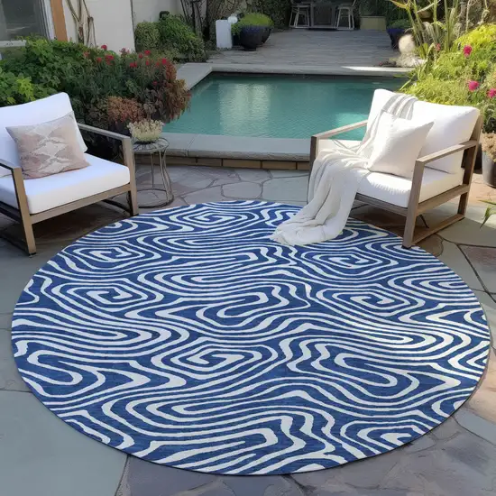8' Navy Blue And Ivory Round Abstract Washable Indoor Outdoor Area Rug Photo 6