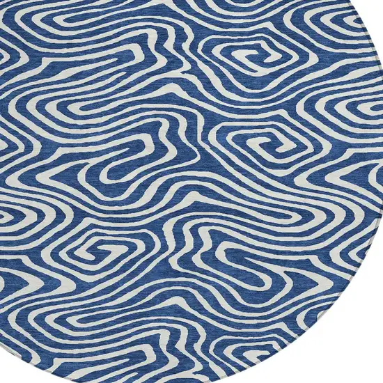 8' Navy Blue And Ivory Round Abstract Washable Indoor Outdoor Area Rug Photo 4