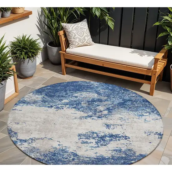 8' Navy Blue And Ivory Round Abstract Washable Indoor Outdoor Area Rug Photo 1
