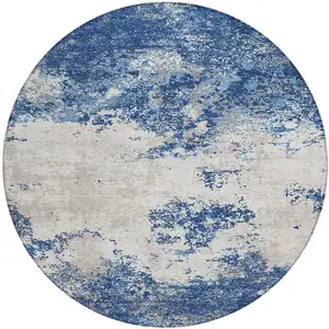Photo of 8' Navy Blue And Ivory Round Abstract Washable Indoor Outdoor Area Rug