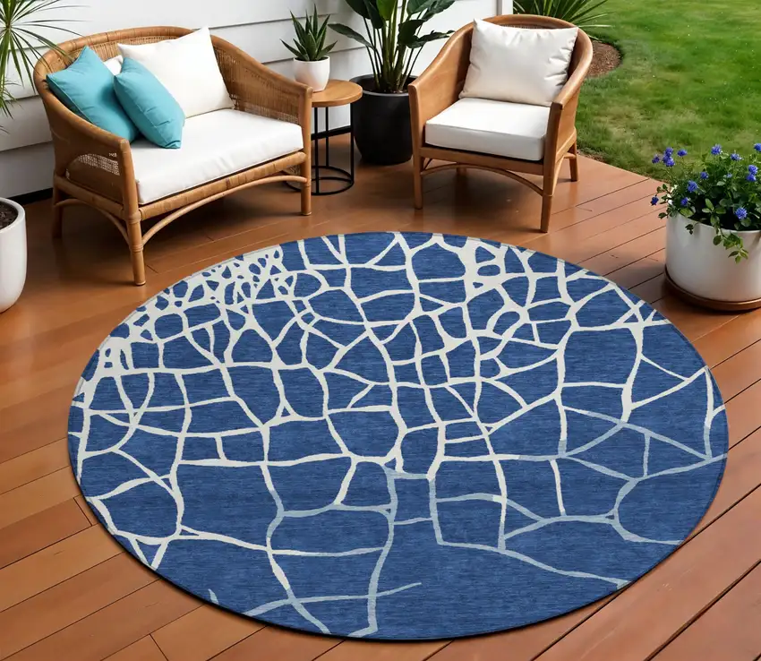 8' Navy Blue And Ivory Round Abstract Washable Indoor Outdoor Area Rug Photo 1