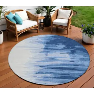 Photo of 8' Navy Blue And Ivory Round Abstract Washable Indoor Outdoor Area Rug