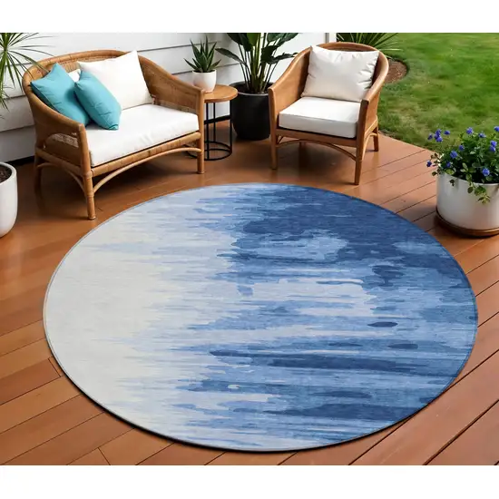 8' Navy Blue And Ivory Round Abstract Washable Indoor Outdoor Area Rug Photo 1