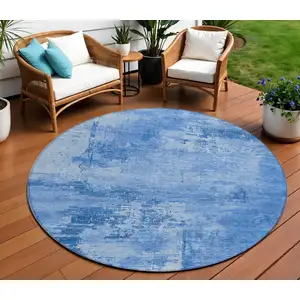 Photo of 8' Navy Blue And Ivory Round Abstract Washable Indoor Outdoor Area Rug