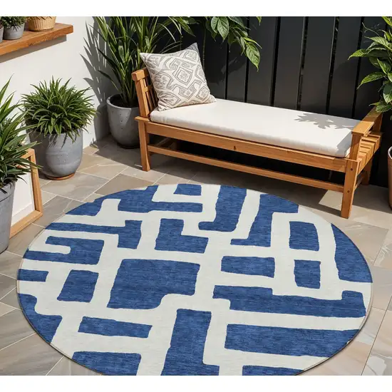8' Navy Blue And Ivory Round Abstract Washable Indoor Outdoor Area Rug Photo 1