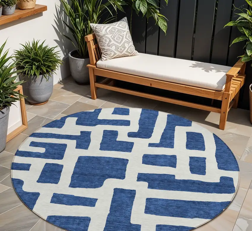 8' Navy Blue And Ivory Round Abstract Washable Indoor Outdoor Area Rug Photo 1
