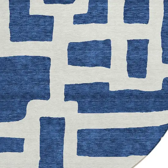 8' Navy Blue And Ivory Round Abstract Washable Indoor Outdoor Area Rug Photo 4