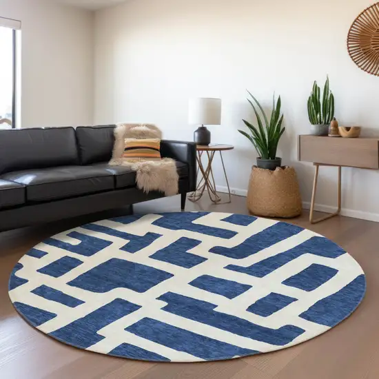 8' Navy Blue And Ivory Round Abstract Washable Indoor Outdoor Area Rug Photo 7