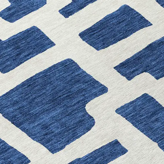 8' Navy Blue And Ivory Round Abstract Washable Indoor Outdoor Area Rug Photo 8