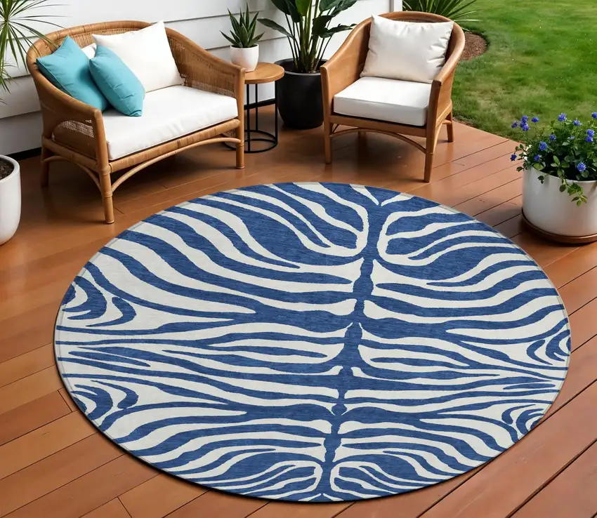 8' Navy Blue And Ivory Round Animal Print Washable Indoor Outdoor Area Rug Photo 1