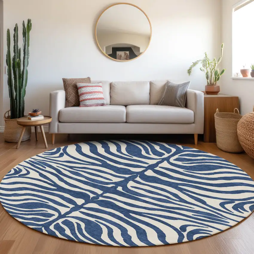 8' Navy Blue And Ivory Round Animal Print Washable Indoor Outdoor Area Rug Photo 8