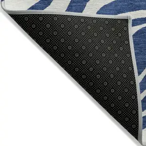Photo of 8' Navy Blue And Ivory Round Animal Print Washable Indoor Outdoor Area Rug