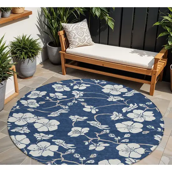 8' Navy Blue And Ivory Round Floral Washable Indoor Outdoor Area Rug Photo 1
