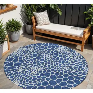 Photo of 8' Navy Blue And Ivory Round Geometric Washable Indoor Outdoor Area Rug