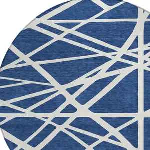 Photo of 8' Navy Blue And Ivory Round Geometric Washable Indoor Outdoor Area Rug