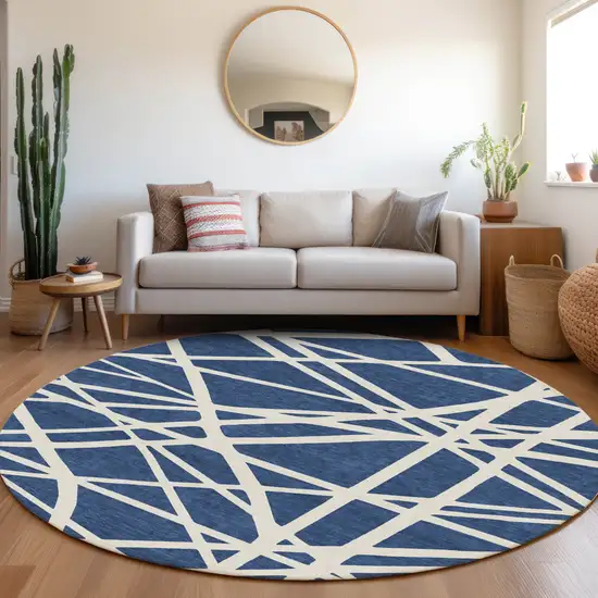 8' Navy Blue And Ivory Round Geometric Washable Indoor Outdoor Area Rug Photo 7