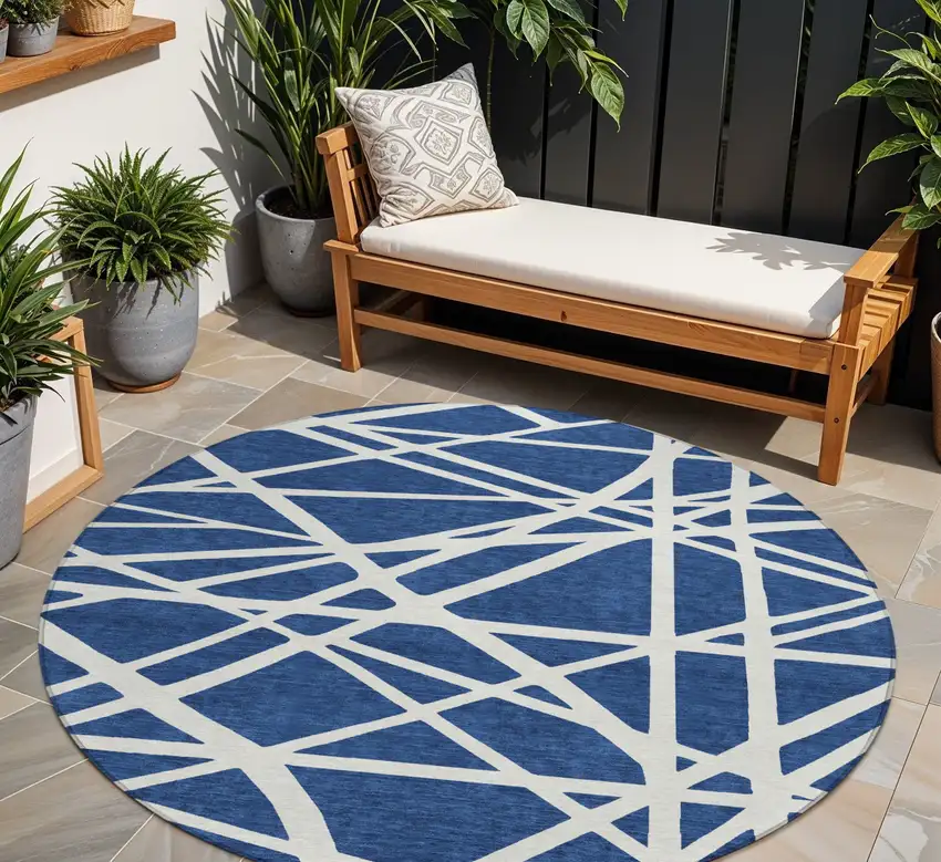 8' Navy Blue And Ivory Round Geometric Washable Indoor Outdoor Area Rug Photo 1