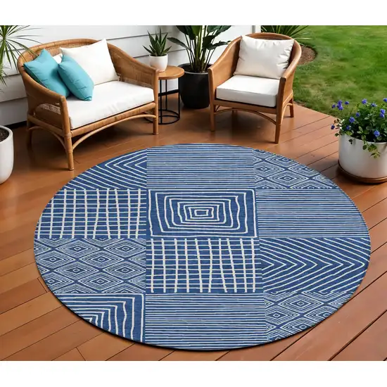8' Navy Blue And Ivory Round Geometric Washable Indoor Outdoor Area Rug Photo 1