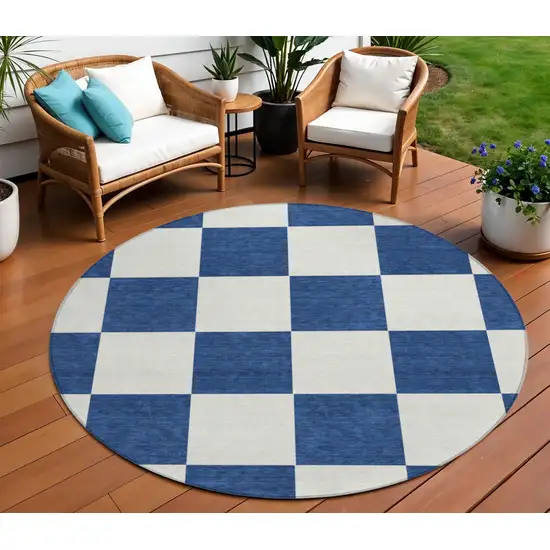 8' Navy Blue And Ivory Round Geometric Washable Indoor Outdoor Area Rug Photo 1