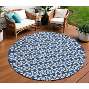 Photo of 8' Navy Blue And Ivory Round Geometric Washable Indoor Outdoor Area Rug